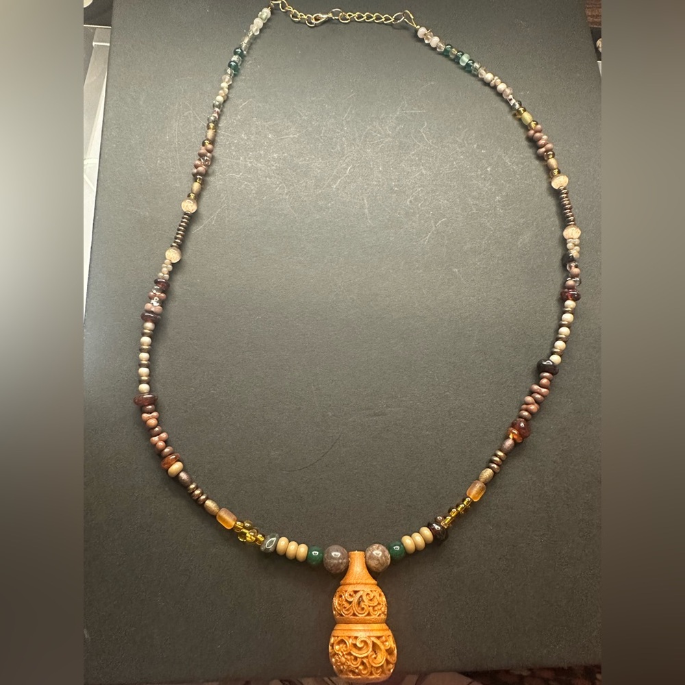 Hand Crafted Multicolor Beaded Necklace with Carved Pendant